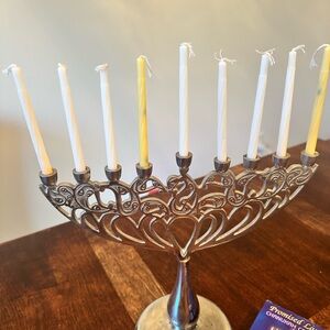 Elegant Silver Menorah with White and Yellow Candles